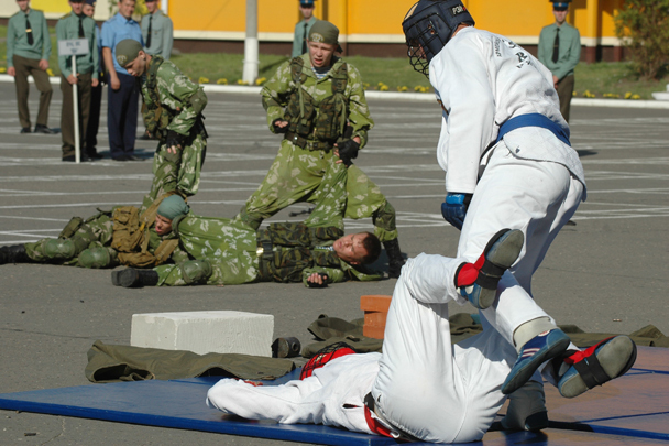 Demonstration performances masters of unarmed combat and army paratroopers on the opening ceremony of the competition