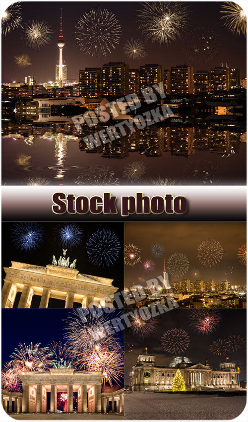      / Celebratory fireworks over night city - stock photos