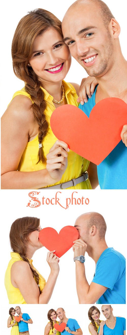 Couple with decorative red heart at Valentines Day - stock photo