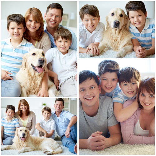 Happy family and white dog - stock photo