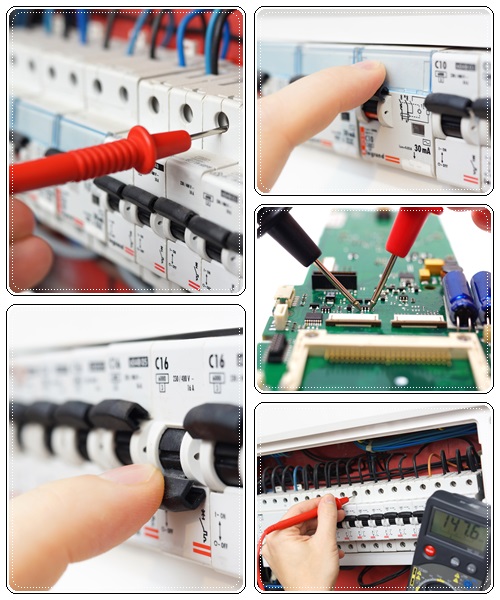 Hand of an electrician with multimeter - stock photo